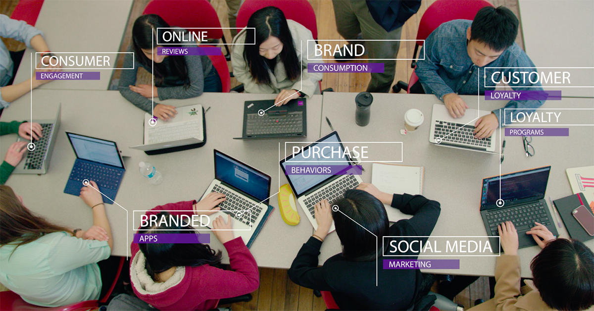 Students at desk with laptops